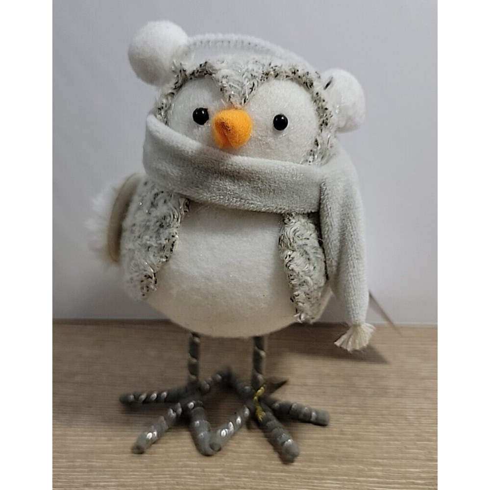 Wonder shop Target 2020 - Amber our feathery friend wearing muffs & scarf